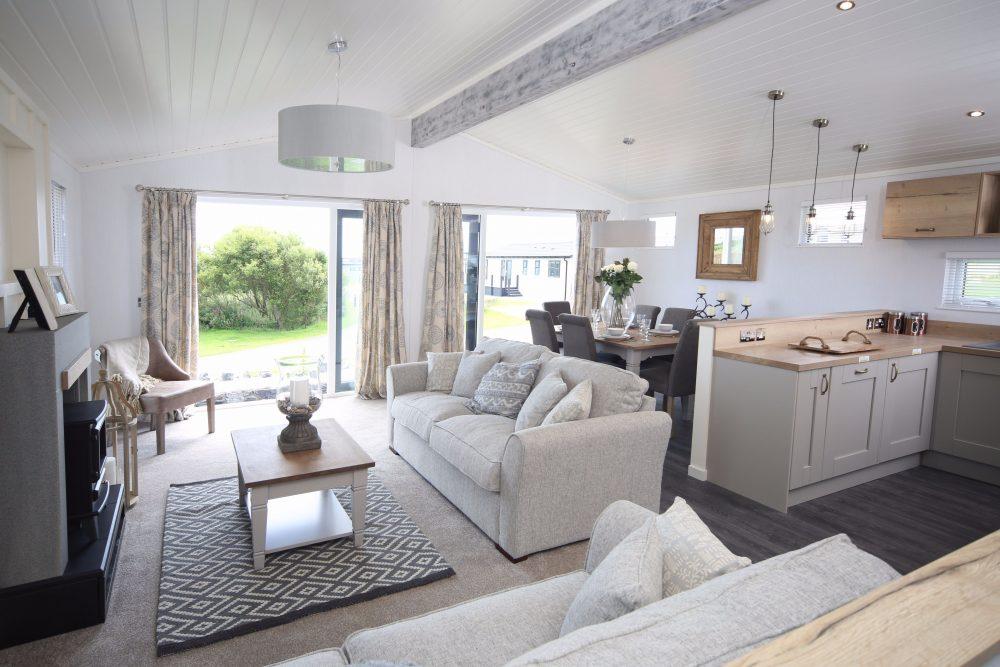 3 Bedroom Wooden Lodge for Sale in Plas Coch Holiday Home Park, LL61 6EJ