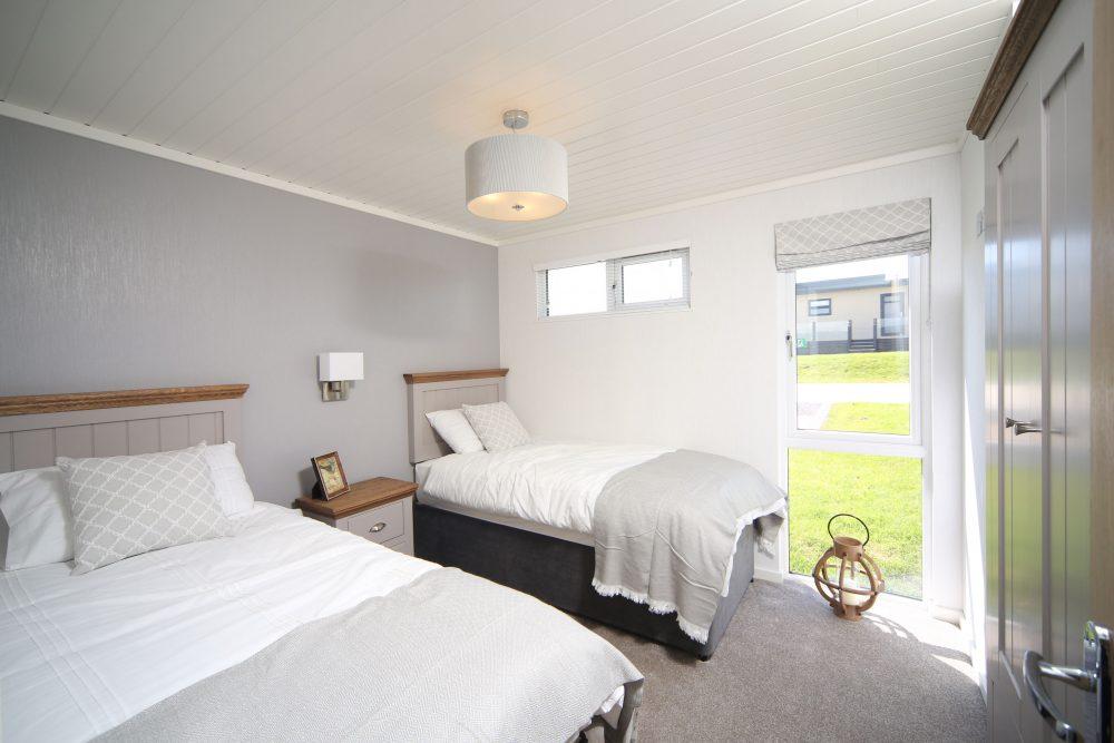3 Bedroom Wooden Lodge for Sale in Plas Coch Holiday Home Park, LL61 6EJ
